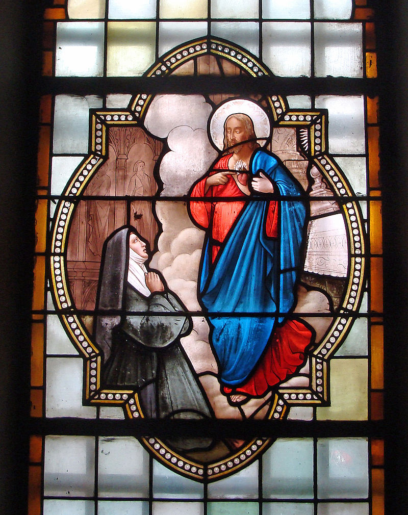 Fête du Sacré-Cœur de Jésus _ Église Saint-Nicolas de L'Hôpital (Moselle) : vitrail de sainte Marguerite-Marie Alacoque et Jésus.